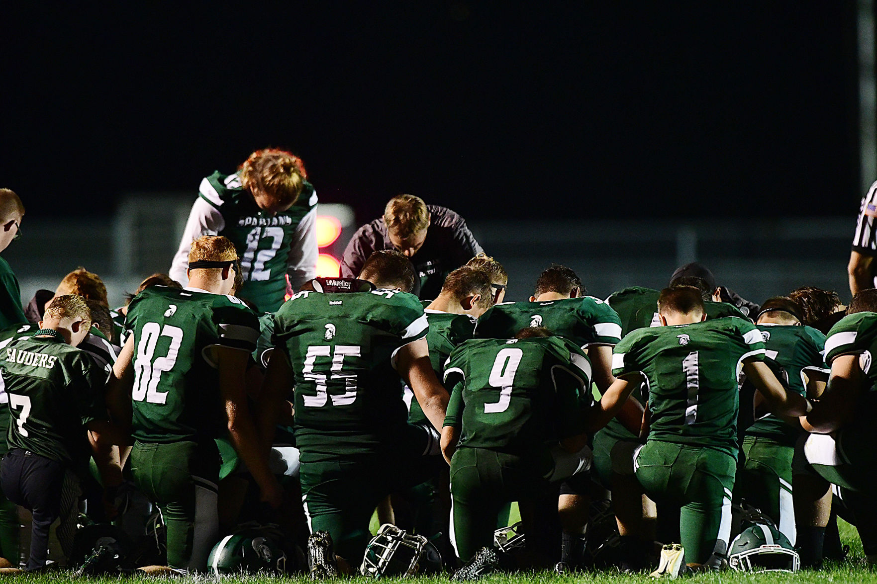 Laurel Spartans pray